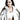 一位深色長髮的女性，穿著 杏色撥水防風外套 <20221670-12> 和運動胸罩，側頭微笑。她的造型體現了日系戶外風格，是戶外活動的理想選擇，以純白色為背景。.