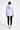 Person wearing a light purple tie-dye hoodie on a white background