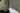 杏色 2合1撥水防風外套 <20621678-12>特寫，拉鍊開啟，展現縫線、布料紋理，以及從內襯到外層渾然天成的舒適保暖抓毛內膽。.