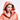 Person wearing a peach-colored raincoat with a hood on a white background