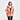 Woman wearing a coral pink jacket on a white background