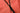 Close-up of a black zipper on a pinkish-red fabric surface