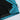 Close-up of a teal jacket with black lining on a white background