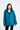 Woman wearing a teal jacket on a white background