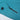 Close-up of a teal fabric with a zipper and button on a white background