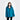 Woman wearing a teal jacket on a white background