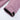 Close-up of a pink jacket sleeve on a white background