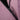 Close-up of a purple jacket with a black zipper