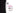 黑色分體裙套裝運動泳衣<22181501>的特寫，粉紅色縫線，顯示尺寸和品牌標籤：WONDA M 和 NAMI WONDA ACTIVE WEAR，加上日文 NAMI 和人字車線細節，以白色為背景。.