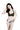 一位女子站在白色背景中，閉著眼睛微笑。她身穿卡其色-MIX&MATCH泳衣上身 <23511476>，露肩領口，下身是黑白圖案的比基尼，一隻手摸著頭髮，另一隻手放在臀部。.