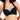 一位女士為深綠色-MIX&MATCH泳衣上身 <23511572>露肩上衣做模特兒，從肩膀到中腰都有交叉設計。在純白的背景下，她的捲髮清晰可見。.