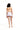 一位捲髮女子赤腳站立，面對遠方，身穿橙色-MIX&MATCH泳衣上身 <23551578>為米色Crop Top和淺紫色荷葉邊迷你裙，在純白背景下，造型充滿溫柔風情。.