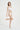 一位女士為白色-MIX&MATCH泳衣下身 <24051531>比基尼下身做模特，單腿站立，背景為純白背景，表情輕鬆地微微側頭。.