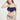 一位女士穿著 NAMI Bikini，搭配深藍色高叉三角 MIX&MATCH泳衣下身 <24051619>，在白色背景下擺姿勢，一隻手插在頭髮上，閉著眼睛，溫柔地微笑著。.