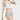 一位女士身穿白色褶邊 NAMI Bikini 上衣和天藍色高叉三角 MIX&MATCH泳衣下身 <24051623>，站在純白背景中。.