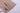 杏色搭帶MIX&MATCH泳衣下身<24151601>特寫：米色彈性泳衣布料，下擺繡有 "namic "粉色刺繡。光滑、略帶亮澤的材質專為修飾身材而設計。.