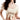 身著杏色日本製泳衣 <423009-IV>、乳白色泳衣的女性。她的臉部部分露出畫框外，波浪狀的髮絲披散在一邊肩膀上。.